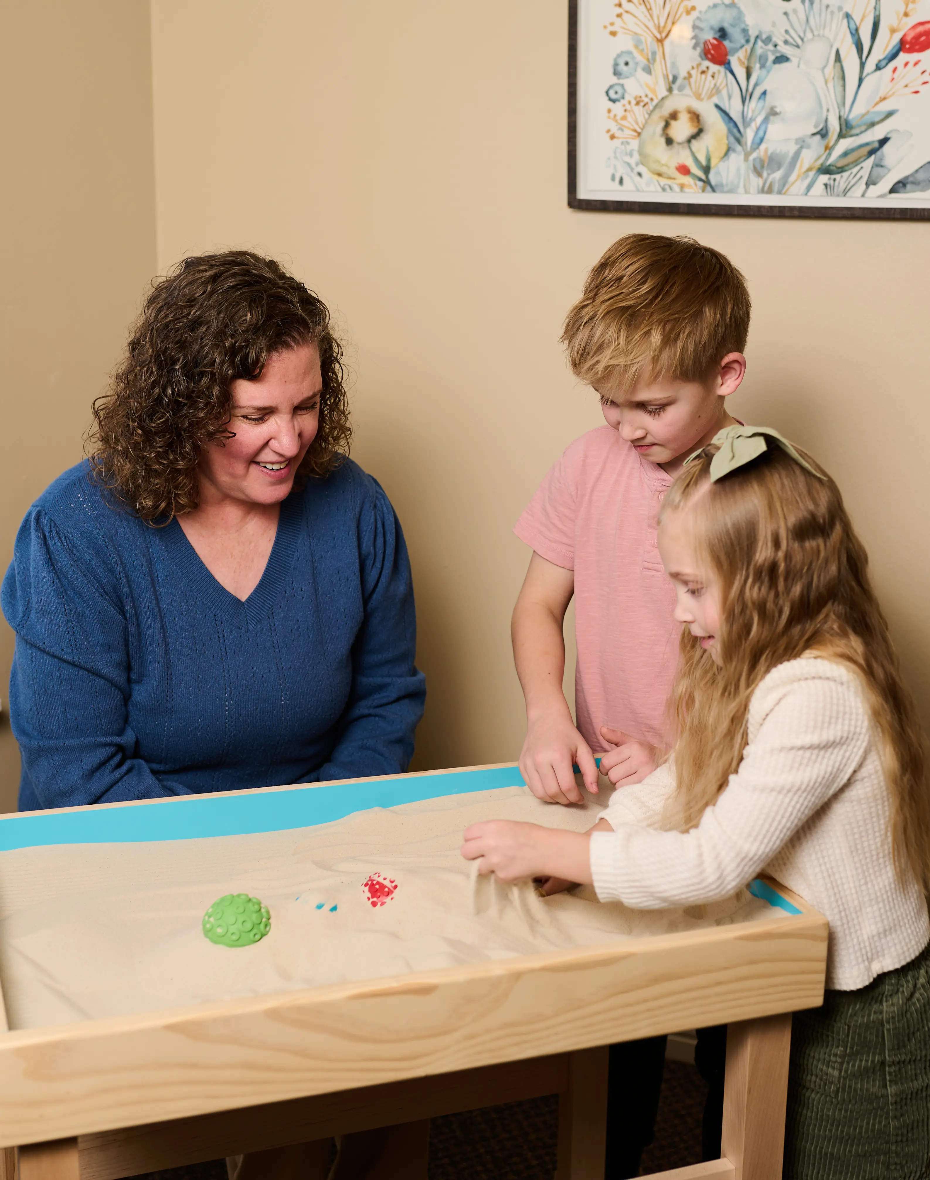 Therapist, Stephanie Heinhold, in her south jordan counseling office helping kids who suffer from trauma