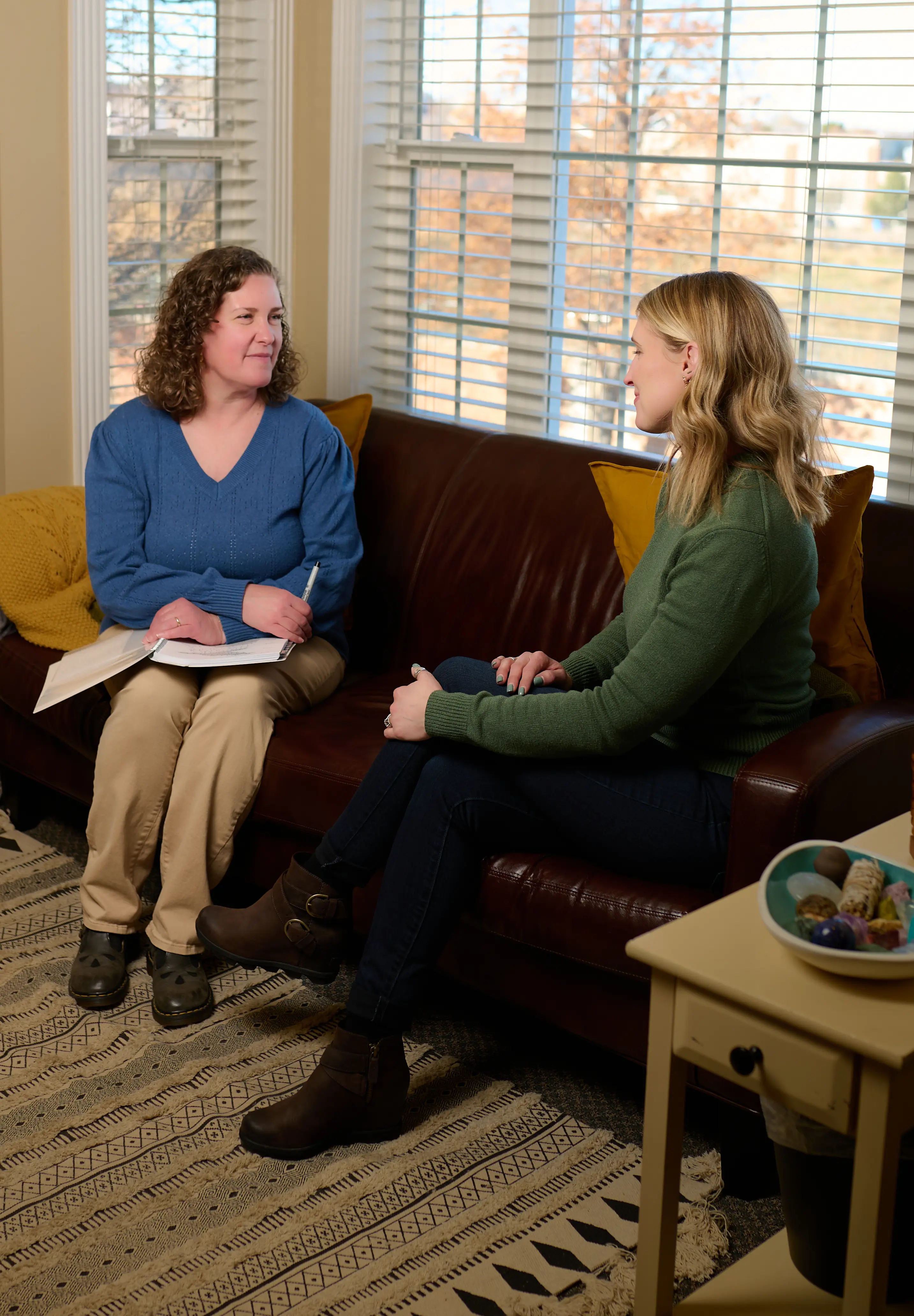 Therapist, Stephanie Heinhold, in her south jordan counseling office helping a woman who struggles with anxiety